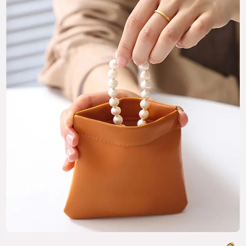 Portable Mini Cosmetic Bag with Squeeze Top Closure